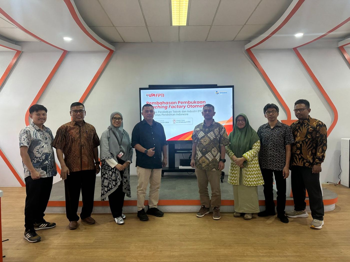 Team photo after the meeting on opening the Automotive Teaching Factory at FPTI UPI